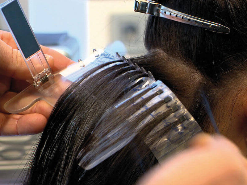 Разделитель прядей при наращивании волос