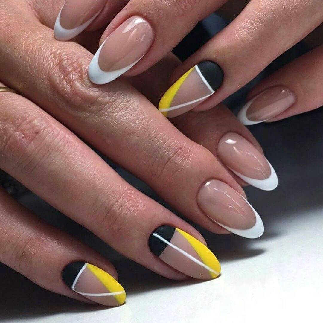 Желтый френч на ногтях с рисунком миндалевидной формы
